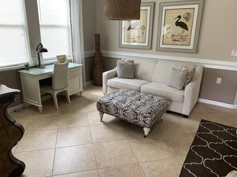 Bright, freshly deep-cleaned living room, spotless and organized